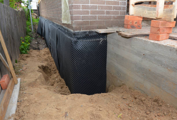 Happy homeowners after waterproofing job in New Waverly
